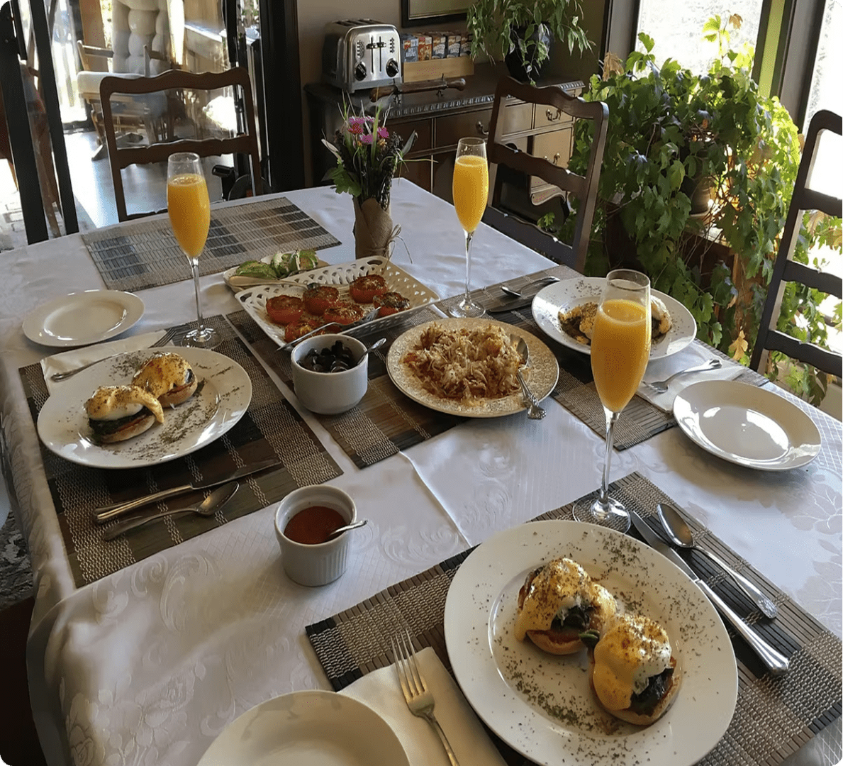 Elegant breakfast setting with various foods