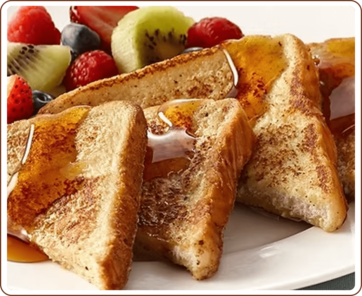 Syrup-drizzled toast and fresh fruit