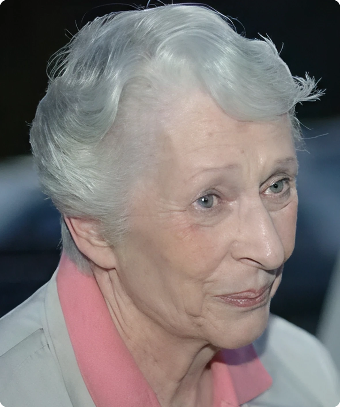 Elderly woman with short gray hair