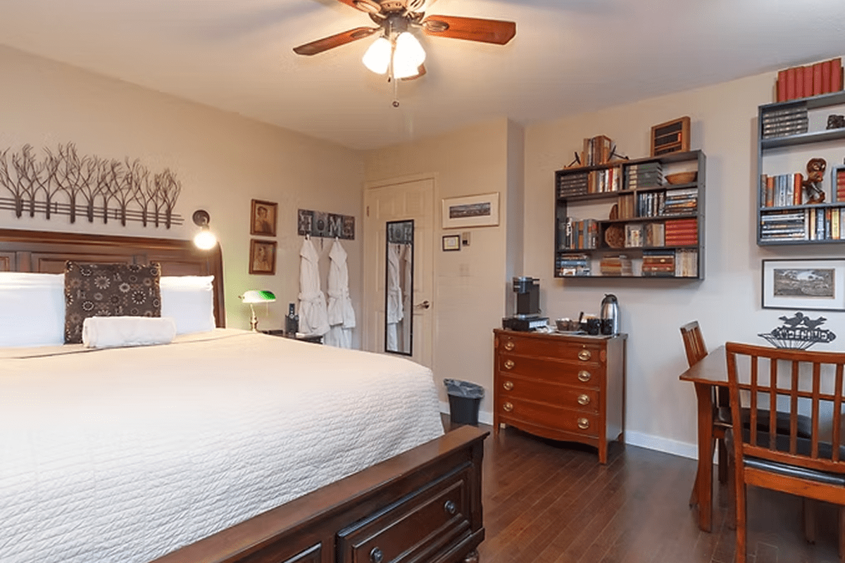 Comfortable bed in well-lit room