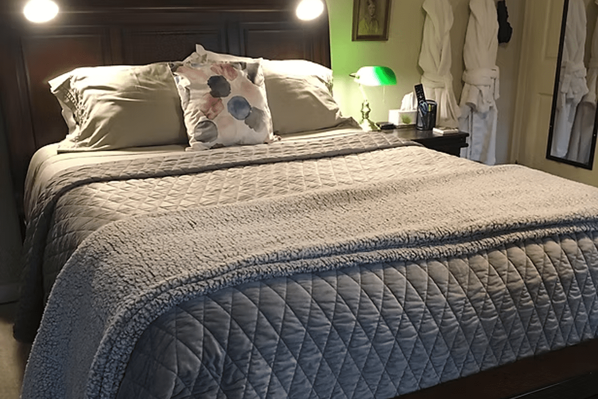 Elegant bed with decorative pillows