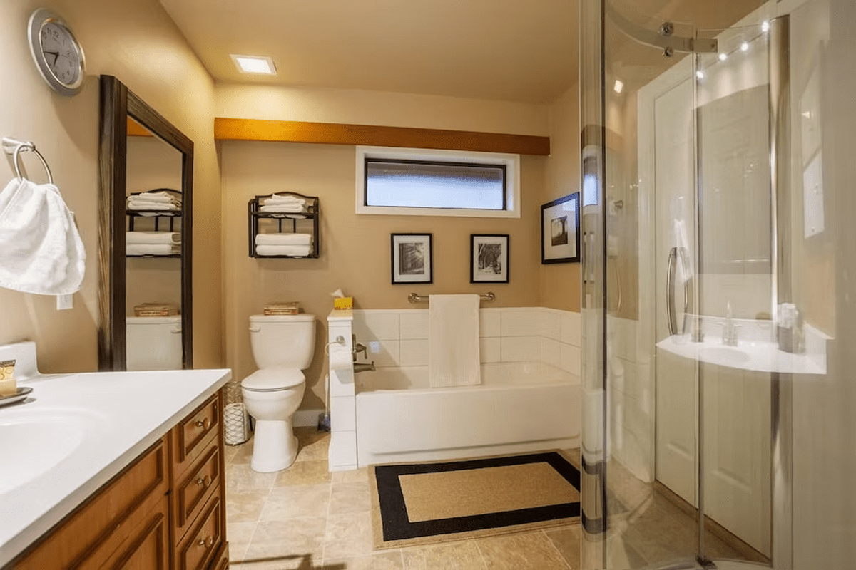 Elegant bathroom with framed art